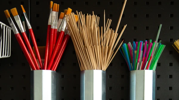 paint brushes sticks and balls inside tianjin international school early childhood classroom